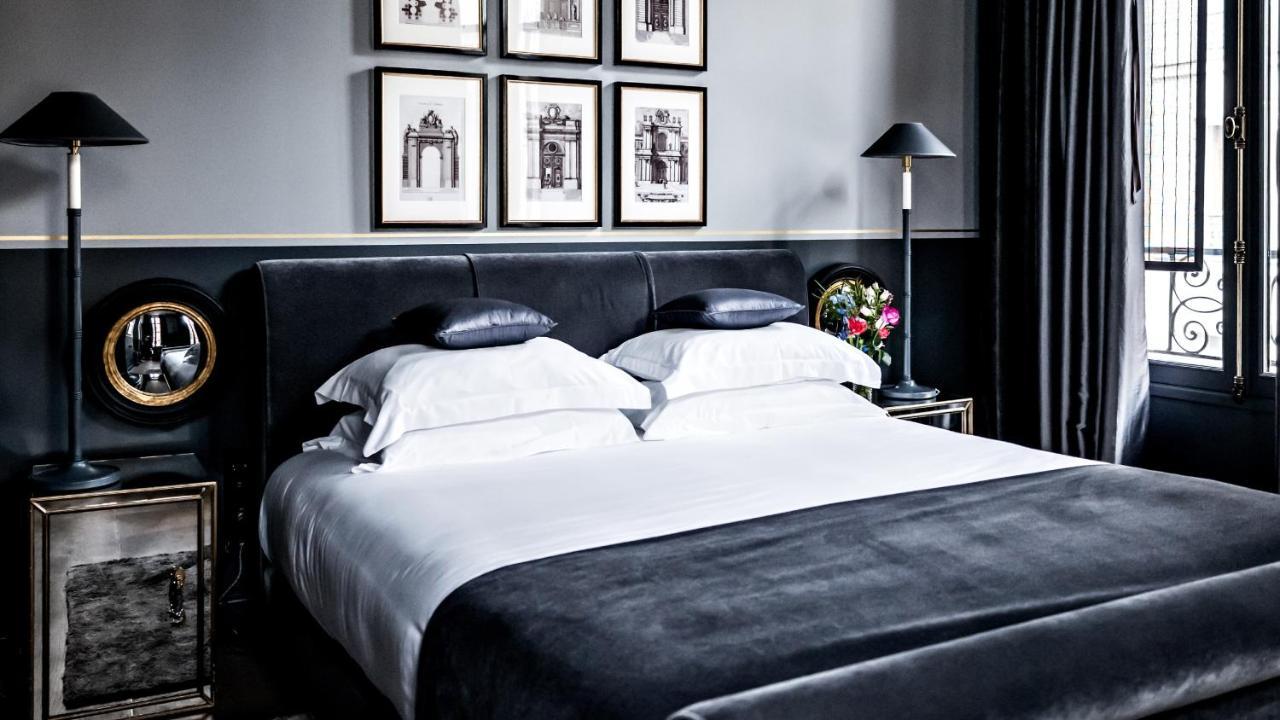 เมอซิเยอ ฌอร์จ โฮเทล แอนด์ สปา - ช็องเซลิเซ่ Hotel ปารีส ภายนอก รูปภาพ A bedroom at the hotel