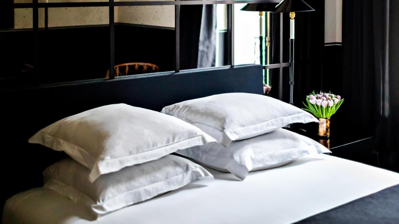 เมอซิเยอ ฌอร์จ โฮเทล แอนด์ สปา - ช็องเซลิเซ่ Hotel ปารีส ภายนอก รูปภาพ Silk pillowcase